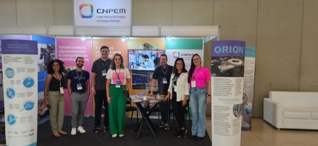 cbv Legend: CNPEM booth with team of staff from the Center. Project Orion was a highlight in conversations with visitors (Photo credit: CNPEM Outreach)